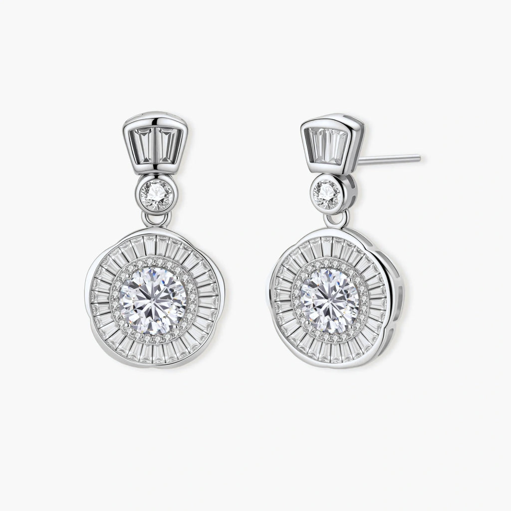 Art Deco-inspired sterling silver drop earrings with tiered moissanite stones in geometric sunburst design