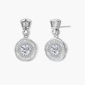 Art Deco-inspired sterling silver drop earrings with tiered moissanite stones in geometric sunburst design
