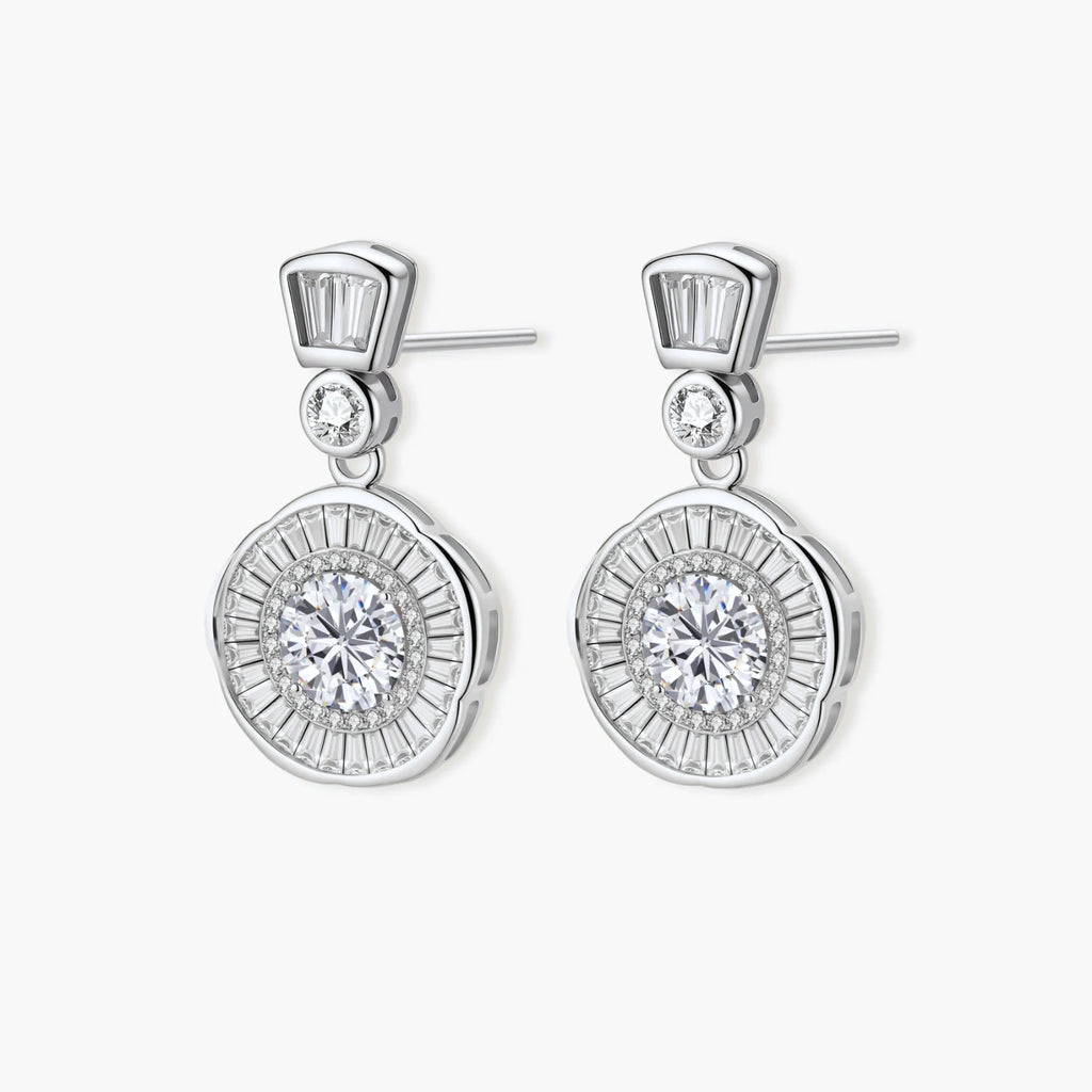 Art Deco-inspired sterling silver drop earrings with tiered moissanite stones in geometric sunburst design