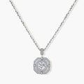 Sterling silver octagonal pendant necklace with brilliant moissanite center stone and halo setting on white background.