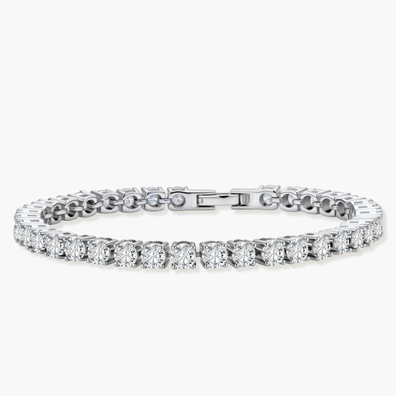 Sterling silver tennis bracelet with continuous row of brilliant moissanite stones and secure clasp closure on cream background.
