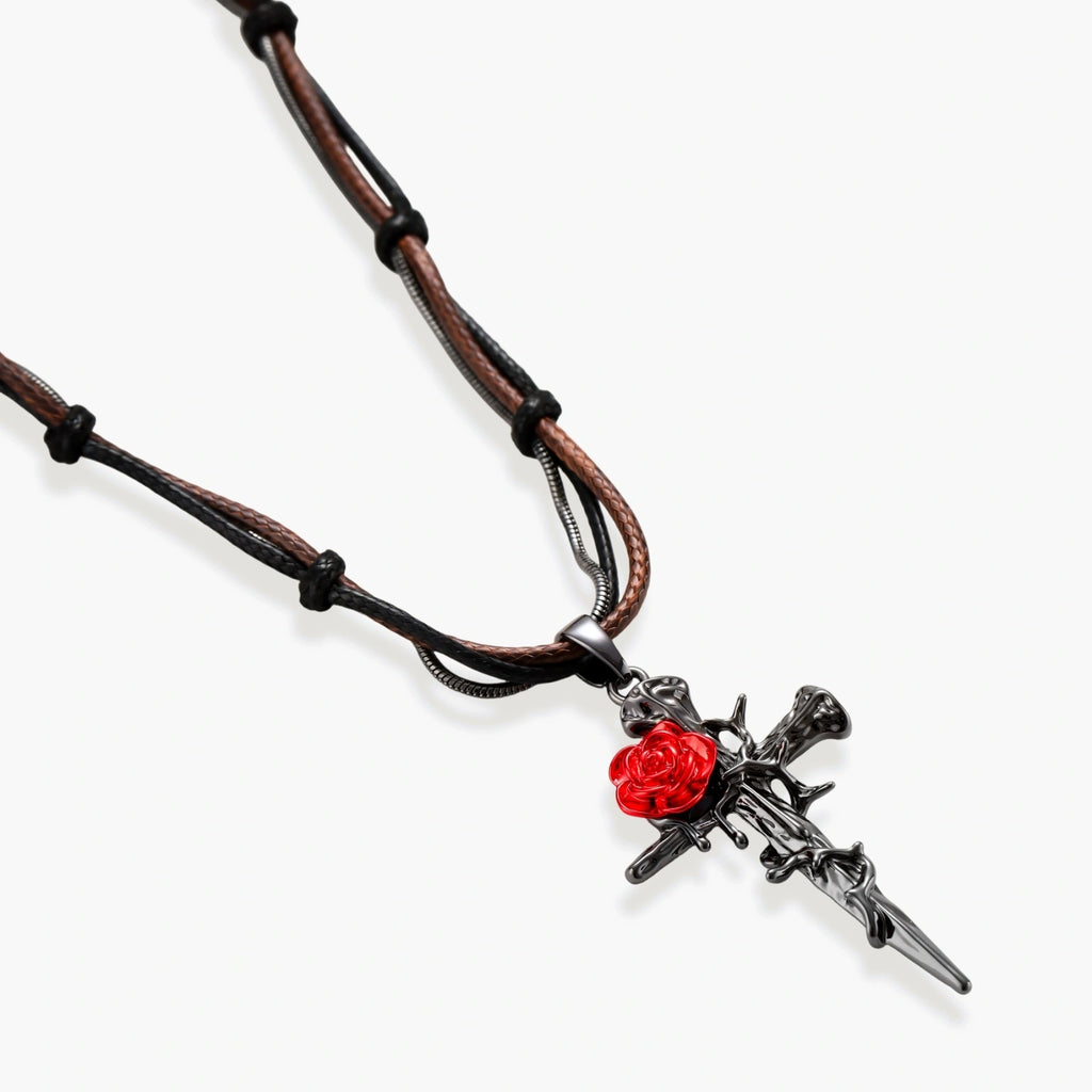 Gothic jewelry set with dark metal thorny cross pendants featuring red enamel roses and matching red crystal earrings