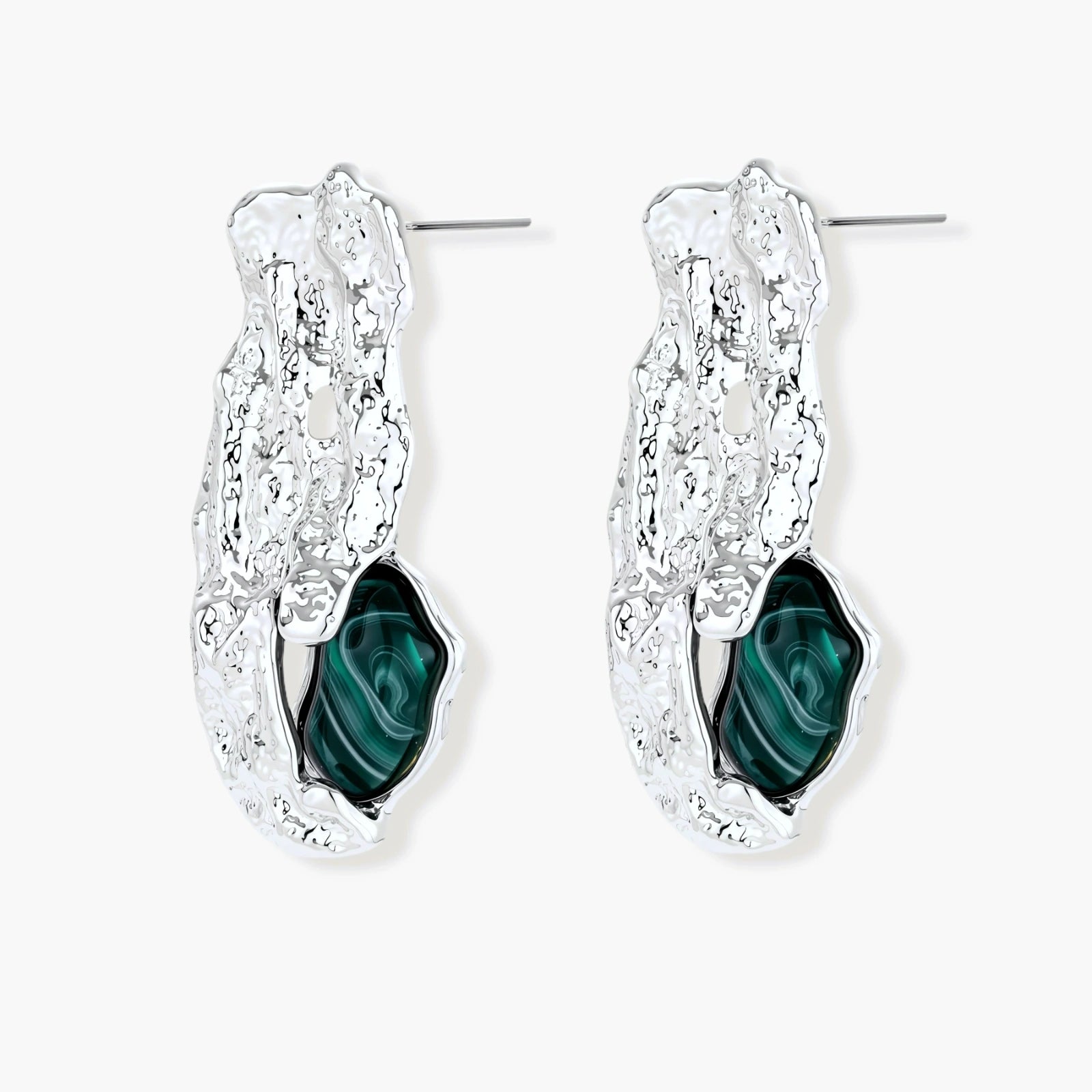 Organic-shaped stud earrings with hammered silver finish and green malachite-pattern resin stones on white background.