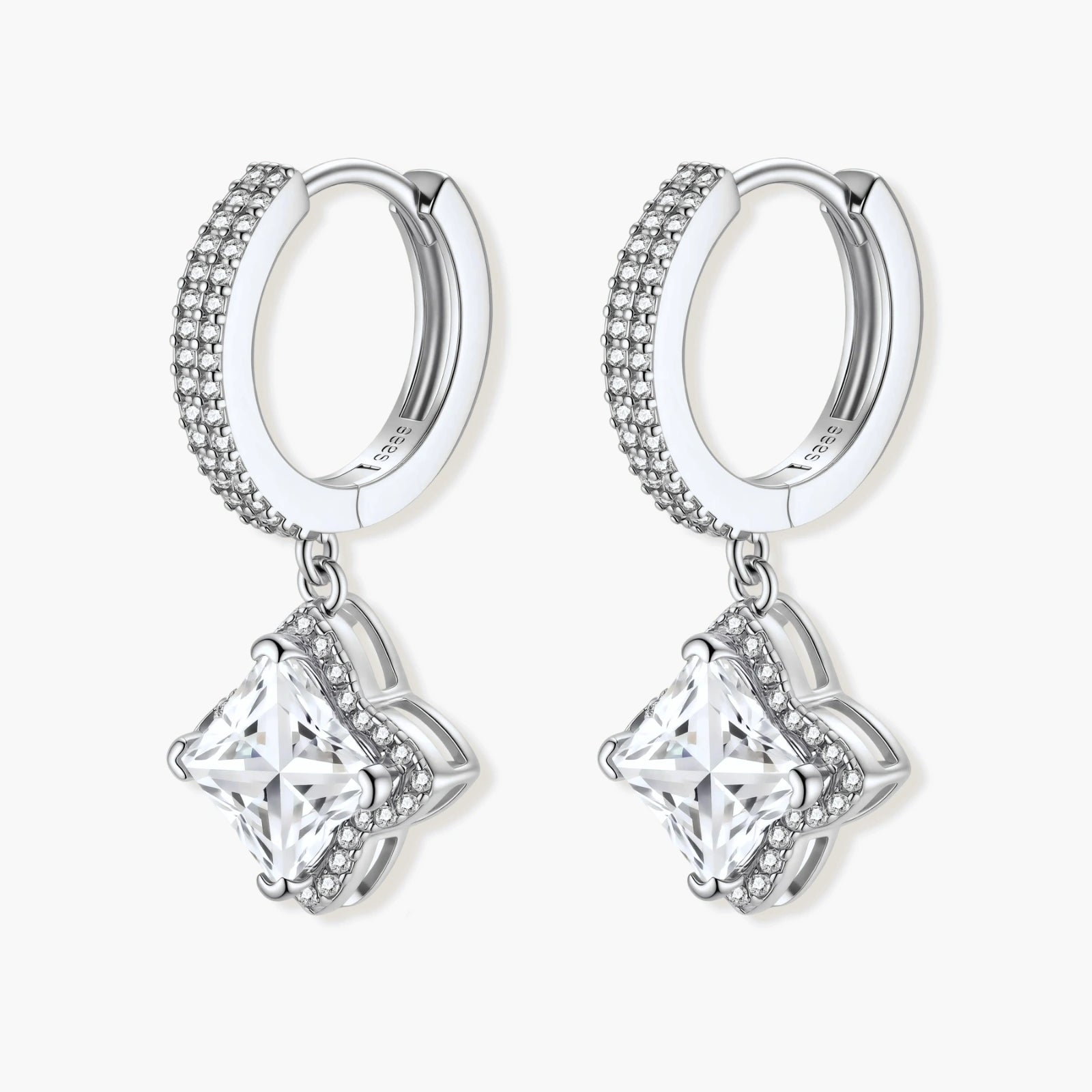 Sterling silver huggie hoops with geometric diamond-shaped moissanite dangles featuring pavé crystal details