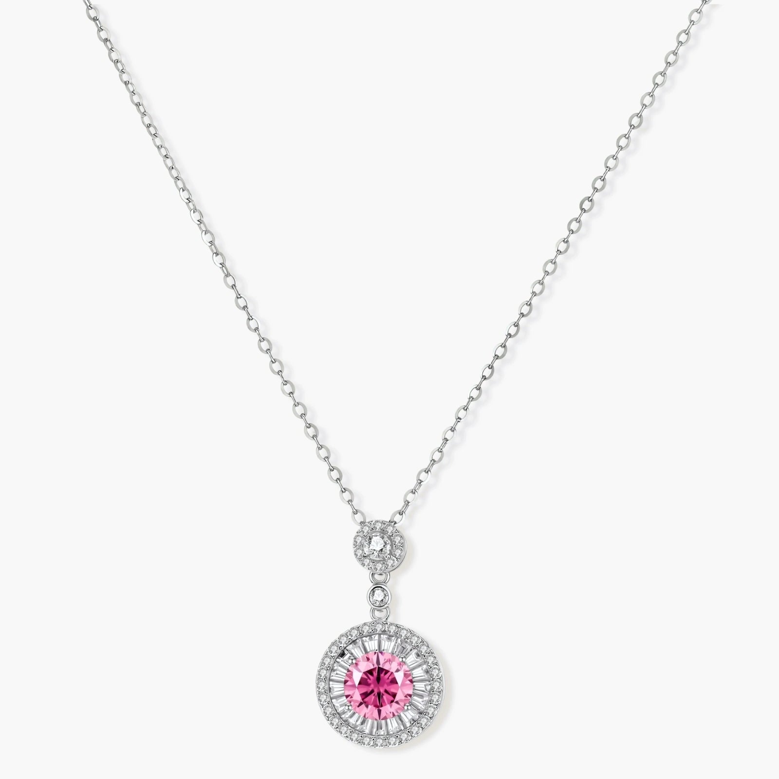 Sterling silver pendant necklace with pink moissanite center stone and clear crystal halo setting on neutral background.